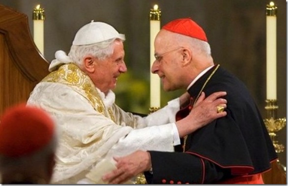 Pope Benedict XVI embraces Chicago's Cardinal Francis George after addressing the bishops at the Basilica of the National Shrine of the Immaculate Conception in Washington, Wednesday, April 16, 2008. The cardinal is president of the U.S. Conference of Catholic Bishops.  (AP Photo/J. Scott Applewhite)