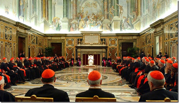 VATICAN CITY - APRIL 22:  Pope Benedict XVI (C) addresses the College of Cardinals as they meet in Clementine hall April 22, 2005 in Vatican City.  Pope Benedict XVI held his first working meeting with the College of Cardinals today. The Pope will hold his first public mass April 24th in Saint Peter's Square.  (Photo by L'Osservatore Romano/Pool-Getty Images)