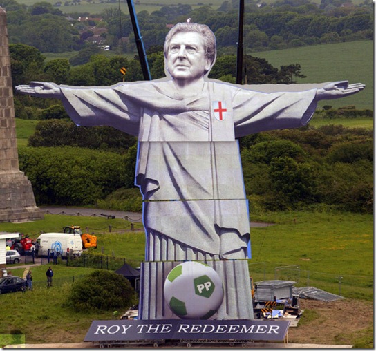 .Paddy Power’s Roy the Redeemer structure - a 108 foot tall reproduction of the iconic Christ the Redeemer statue featuring the face of England Manager Roy Hodgson, stands on the White Cliffs of Dover as part of the bookmaker’s We Hear You initiative ahead of this month’s European Football Championship.  PRESS ASSOCIATION Photo. Picture date: Thursday June 7, 2012. The structure, which is visible from France and took a team of engineers two months to create and one week to install, has been created in response to the plight of anxious England fans who felt their team needed ‘divine intervention’ for success during the European Football Championships. Photo credit should read: David Parry/PA