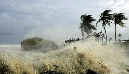 Waves break against a house in Baracoa, Cuba, some 12 miles west of Havana, Monday, Oct. 24, 2005. The ocean spread up to four blocks inland, inundating streets and buildings with water up to three feet deep. (AP Photo/Eduardo Verdugo)